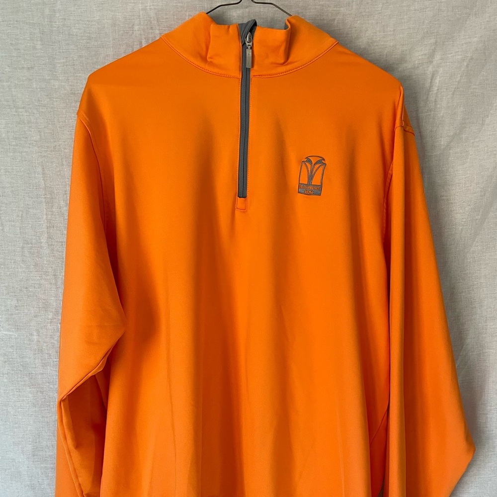 Three quarter zip long sleeve golf shirt w/ Blackwolf Run golf course logo.
